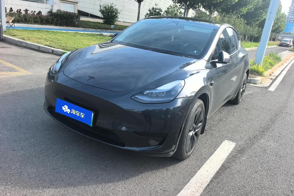 Tesla Model Y 2024 — фото автомобиля